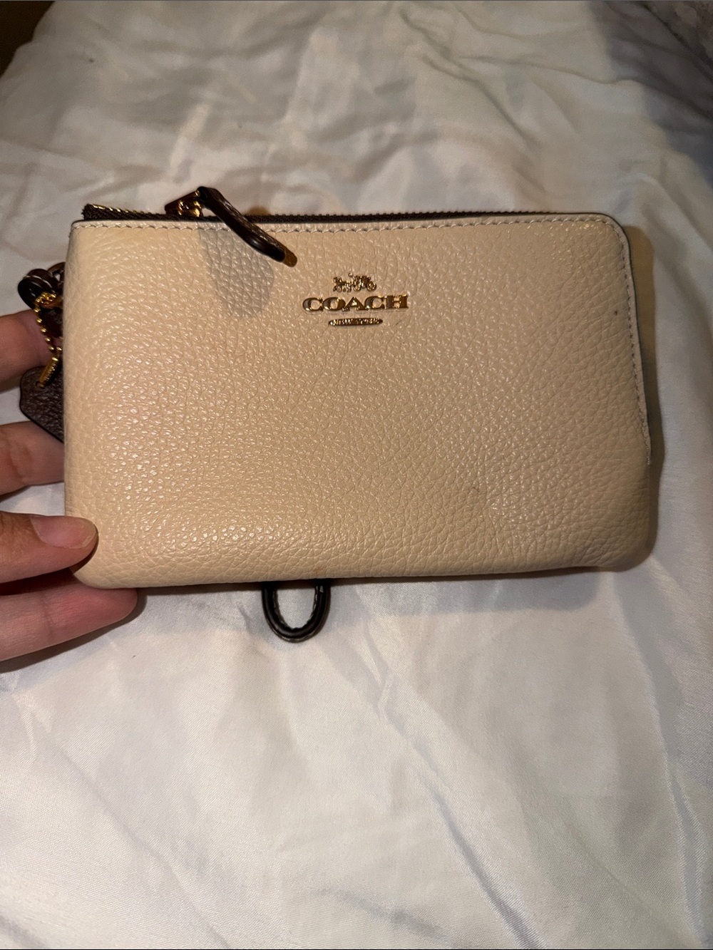 Coach Pebbled Leather Wristlet in Light Beige with Gold Logo